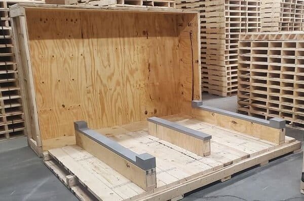 Wooden shipping crate, open and durable, ideal for heavy goods packaging.