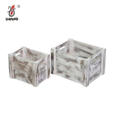 Small rustic wooden storage crates, distressed white finish, stylish for home decor.