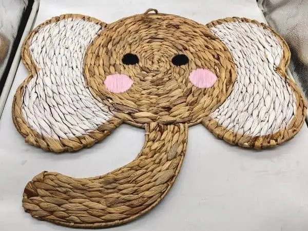Woven animal-shaped mat
