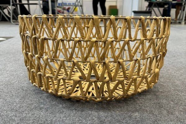 Open-weave rattan storage basket, decorative design