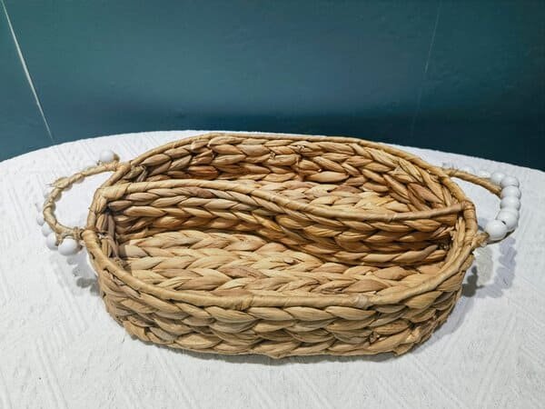 Oval woven serving trays with bead handles